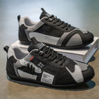 Atlas Racer Sneaker in Black - Side Profile Stacked