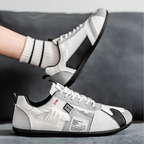 Atlas Racer Sneaker in White - Side Profile on Foot